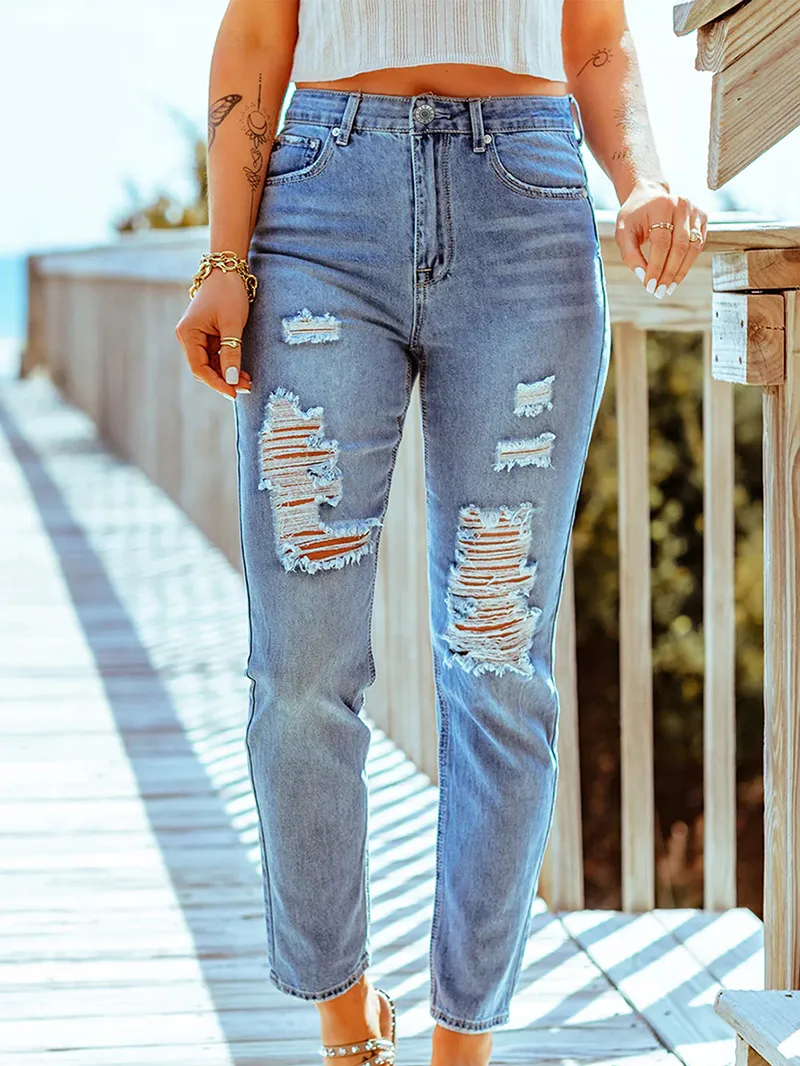 Ladies simple ripped skinny jeans