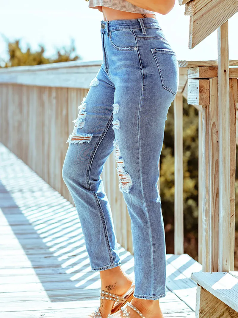 Ladies simple ripped skinny jeans