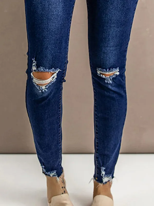Women's ripped slim fit button jeans